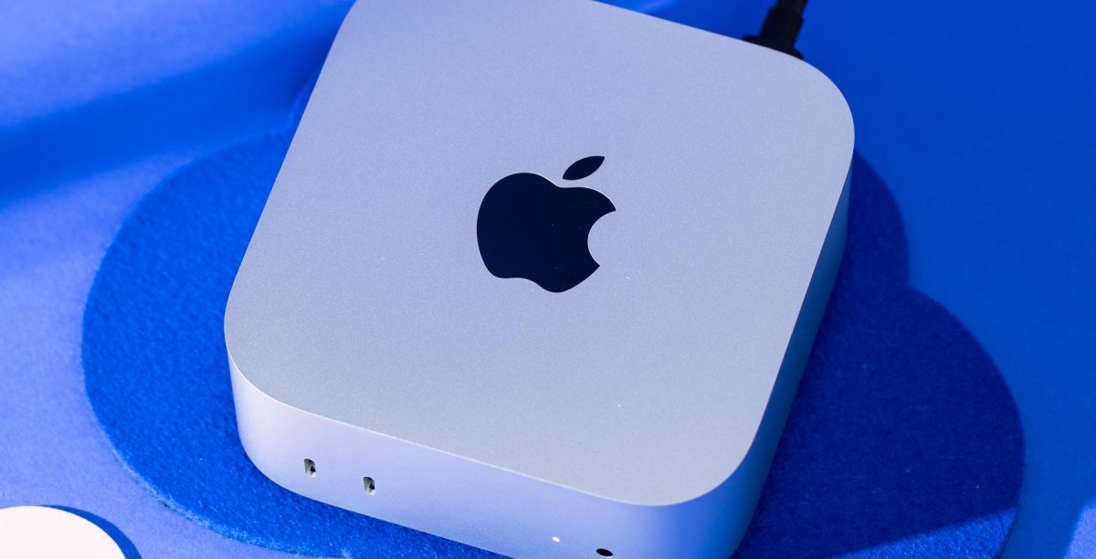 Apple M6 Mac Mini compact desktop computer shown in a product-style shot